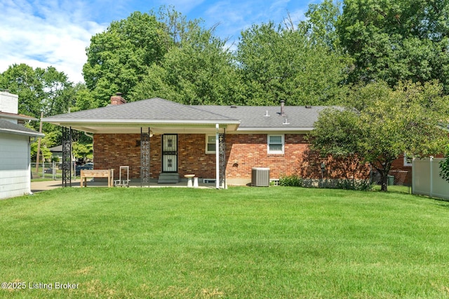 4011 White Plains Ct, Louisville, KY 40218 - back of house featuring brick siding, a chimney, and a shingled roof