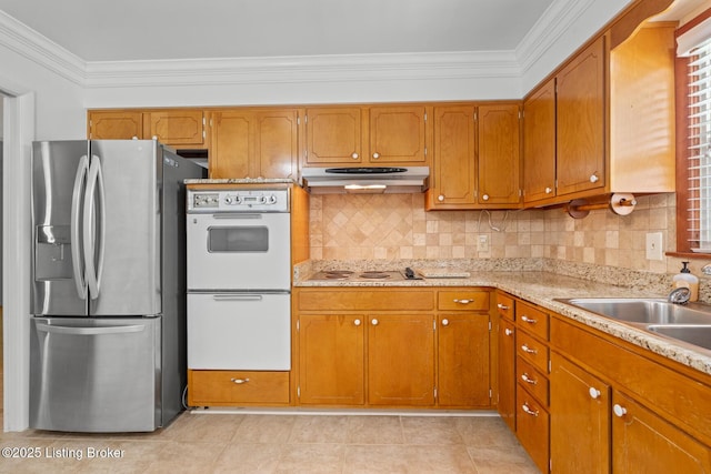 4011 White Plains Ct, Louisville, KY 40218 - kitchen featuring stainless steel fridge, double oven, under cabinet range hood, crown molding, and brown cabinetry