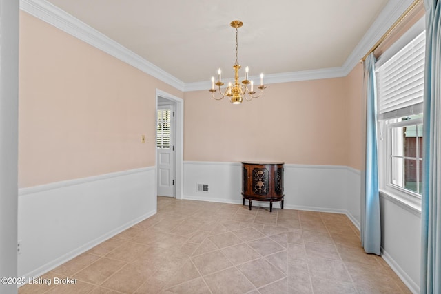 4011 White Plains Ct, Louisville, KY 40218 - spare room with a chandelier, crown molding, and light tile patterned flooring
