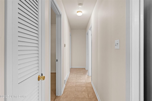4011 White Plains Ct, Louisville, KY 40218 - corridor featuring light tile patterned floors and baseboards