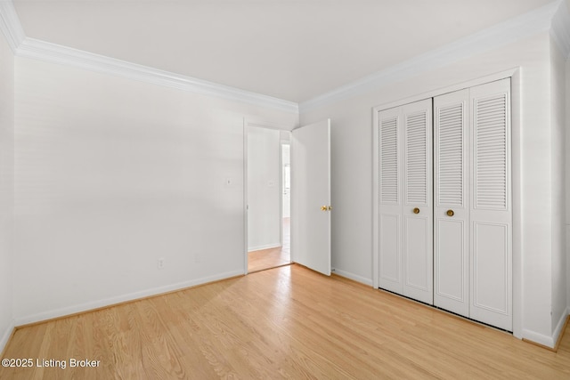 4011 White Plains Ct, Louisville, KY 40218 - unfurnished bedroom with crown molding, light wood-style floors, and a closet