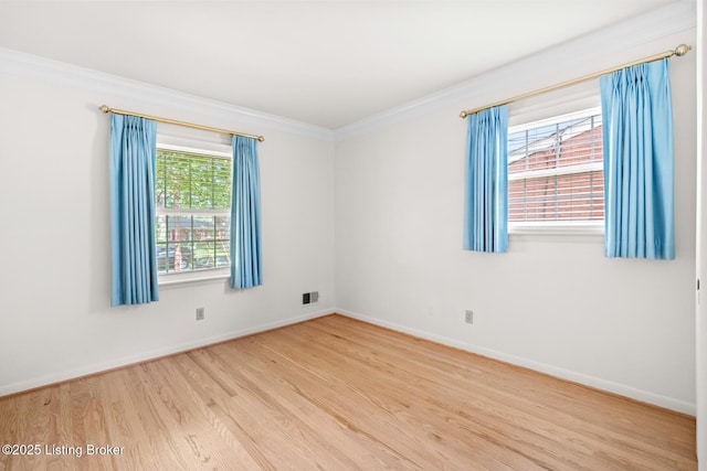 4011 White Plains Ct, Louisville, KY 40218 - spare room featuring wood finished floors and crown molding