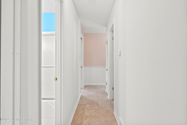4011 White Plains Ct, Louisville, KY 40218 - hallway featuring baseboards and light tile patterned flooring