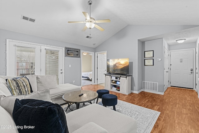 10200 Deer Vista Dr Unit 201, Louisville, KY 40291 - living area with ceiling fan, light wood-style flooring, vaulted ceiling, and baseboards