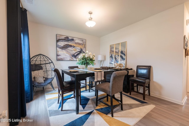 11905 Cascade Falls Trl, Louisville, KY 40229 - dining area with wood finished floors, baseboards, and an office area