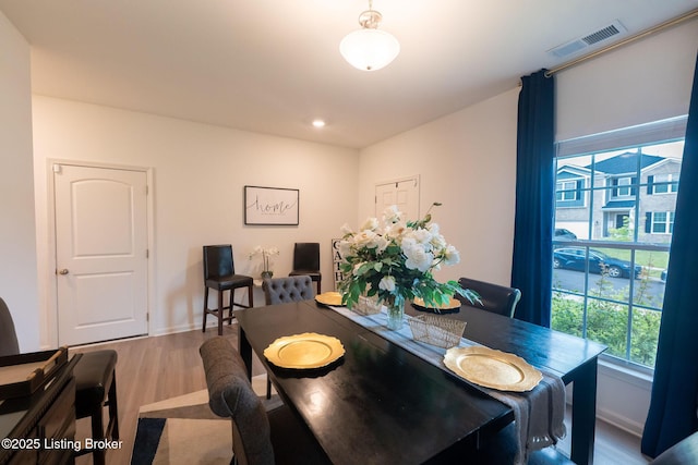 11905 Cascade Falls Trl, Louisville, KY 40229 - dining space featuring wood finished floors, baseboards, and recessed lighting