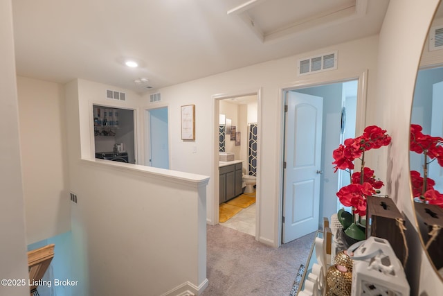 11905 Cascade Falls Trl, Louisville, KY 40229 - hall featuring attic access, light colored carpet, and baseboards