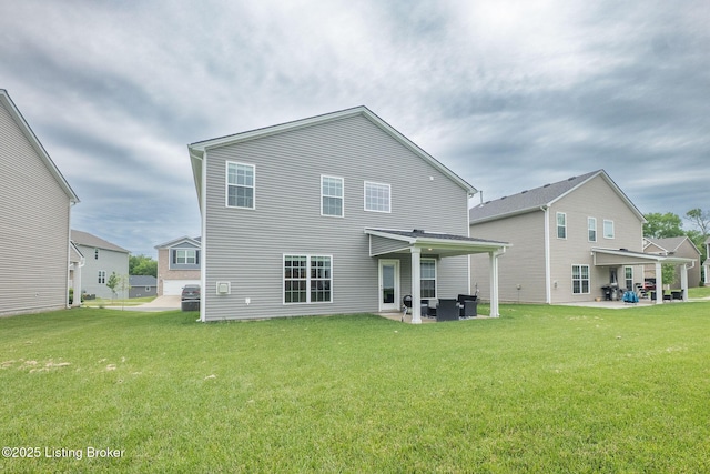 11905 Cascade Falls Trl, Louisville, KY 40229 - back of property featuring a patio and a yard