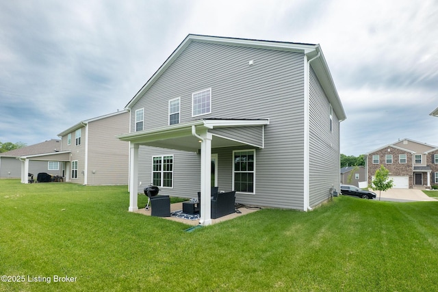 11905 Cascade Falls Trl, Louisville, KY 40229 - back of property featuring a lawn and a patio area