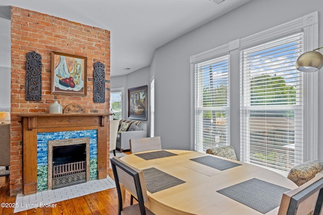 dining space featuring wood finished floors