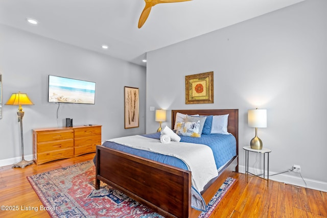 bedroom with baseboards, light wood-style floors, recessed lighting, and ceiling fan