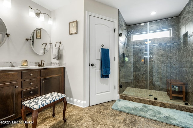 17900 Meremont Heights Way, Louisville, KY 40245 - bathroom with a shower stall, double vanity, and baseboards