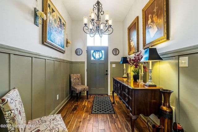 17900 Meremont Heights Way, Louisville, KY 40245 - entrance foyer featuring a chandelier, dark wood-style floors, a wainscoted wall, and a decorative wall