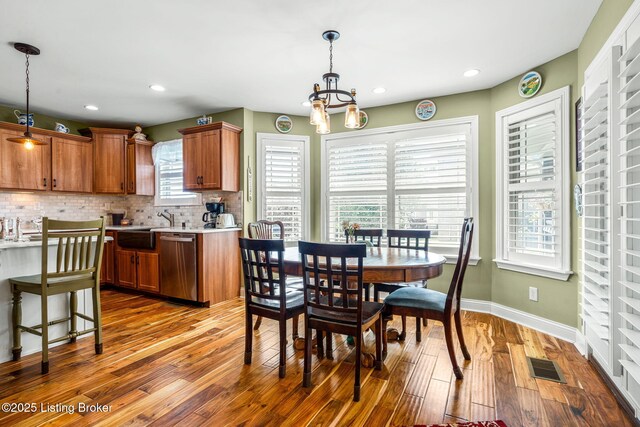 17900 Meremont Heights Way, Louisville, KY 40245 - dining space featuring hardwood / wood-style floors, a chandelier, baseboards, and recessed lighting