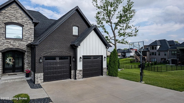 118 Stable Way, Jeffersonville, IN 47130 - view of front of property featuring stone siding, board and batten siding, driveway, a garage, and a residential view