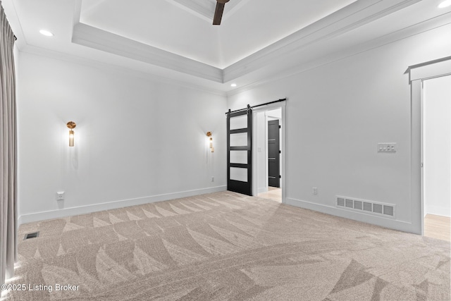 118 Stable Way, Jeffersonville, IN 47130 - carpeted spare room with recessed lighting, a barn door, baseboards, ornamental molding, and a high ceiling