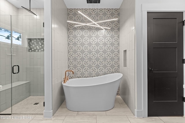 118 Stable Way, Jeffersonville, IN 47130 - full bath with a shower stall, a freestanding tub, tile walls, tile patterned floors, and a chandelier