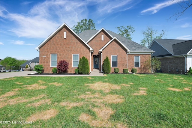 13005 Vista Dr, Prospect, KY 40059 - view of front facade with brick siding and a front yard