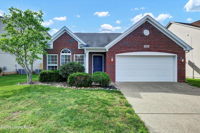11601 Top Walnut Loop, Louisville, KY 40229 - view of front of home featuring brick siding, driveway, a garage, a front lawn, and cooling unit