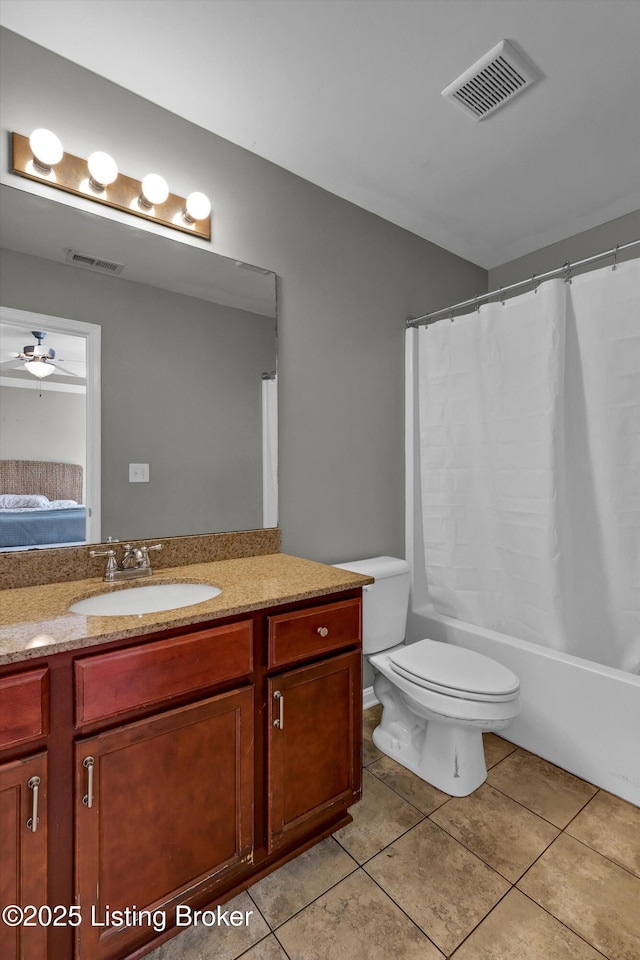 11601 Top Walnut Loop, Louisville, KY 40229 - full bathroom with vanity, tile patterned floors, toilet, shower / tub combo, and a ceiling fan