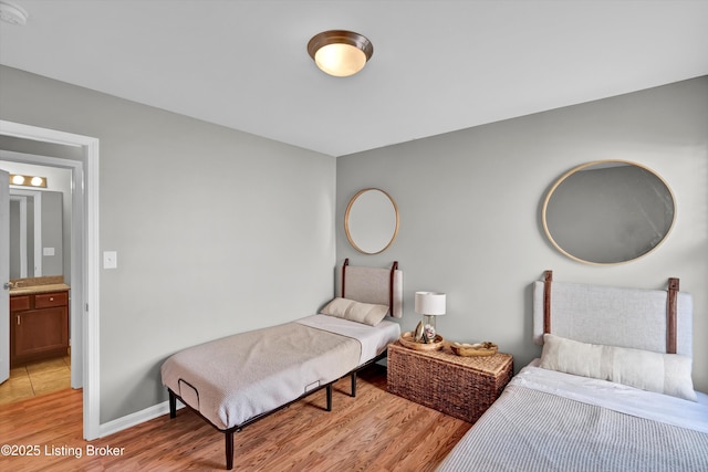 11601 Top Walnut Loop, Louisville, KY 40229 - bedroom with light wood-type flooring and baseboards