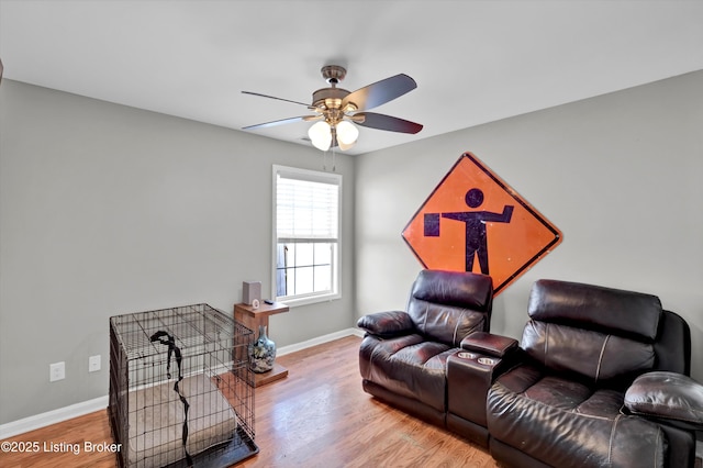 11601 Top Walnut Loop, Louisville, KY 40229 - sitting room with a ceiling fan, baseboards, and wood finished floors