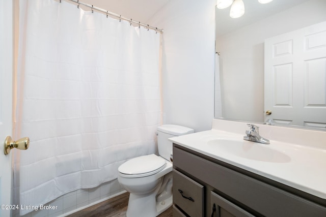 4225 Treesdale Dr, Sellersburg, IN 47172 - full bath featuring toilet, vanity, a shower with shower curtain, and wood finished floors