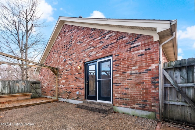 4225 Treesdale Dr, Sellersburg, IN 47172 - view of exterior entry featuring a gate and brick siding