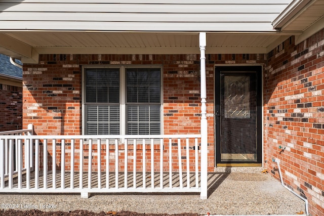 4225 Treesdale Dr, Sellersburg, IN 47172 - doorway to property with a porch and brick siding