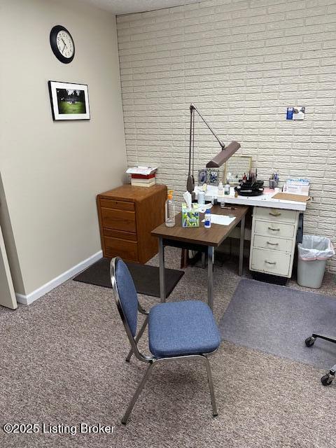 4012 Dupont Cir Unit 214, Louisville, KY 40207 - carpeted office featuring brick wall and baseboards
