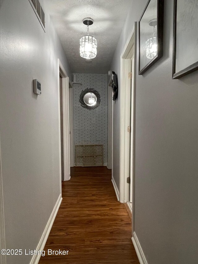 7102 Gorham Way, Louisville, KY 40291 - hallway featuring baseboards, wood finished floors, and wallpapered walls