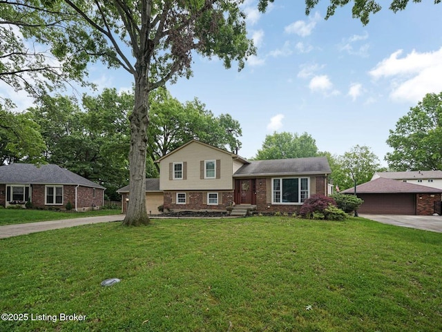 8703 Bards Ct, Louisville, KY 40299 - split level home featuring brick siding, a front lawn, driveway, and a garage
