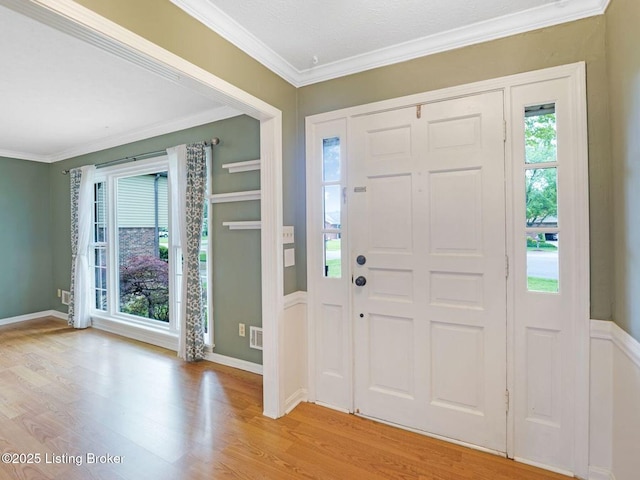 8703 Bards Ct, Louisville, KY 40299 - entryway featuring light wood-style flooring and ornamental molding