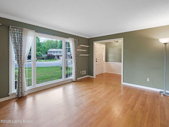 8703 Bards Ct, Louisville, KY 40299 - spare room with light wood finished floors, crown molding, and baseboards