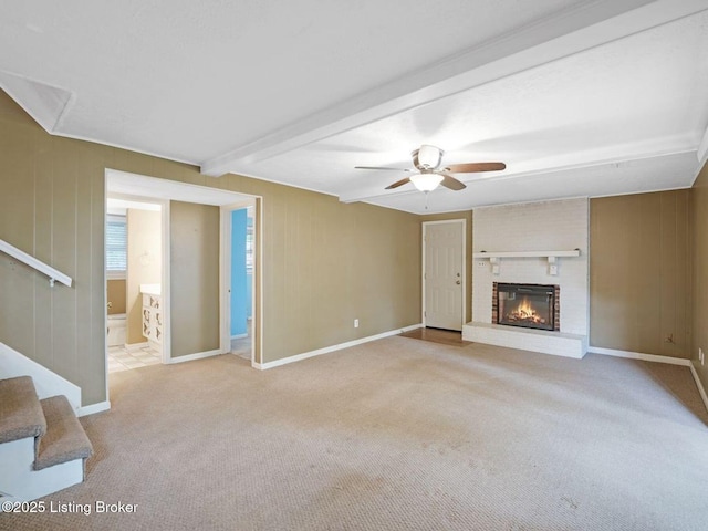 8703 Bards Ct, Louisville, KY 40299 - unfurnished living room featuring carpet, stairs, beam ceiling, ceiling fan, and a fireplace
