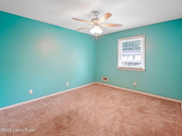 8703 Bards Ct, Louisville, KY 40299 - spare room with carpet flooring, baseboards, and a ceiling fan