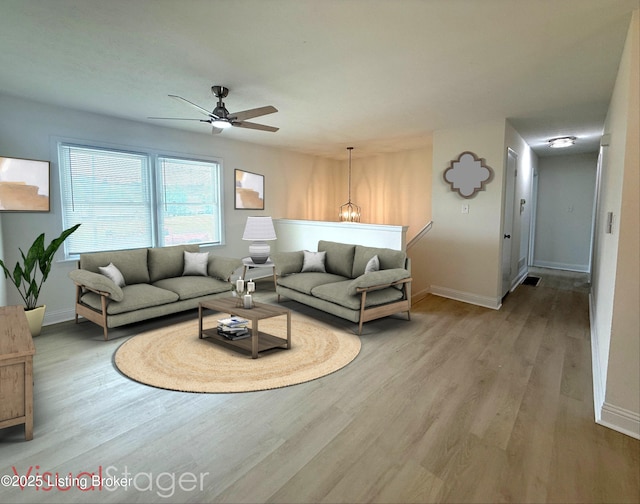 11302 Deering Rd, Louisville, KY 40272 - living area featuring a ceiling fan and wood finished floors