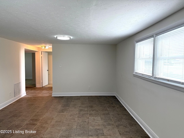 11302 Deering Rd, Louisville, KY 40272 - unfurnished room with a textured ceiling
