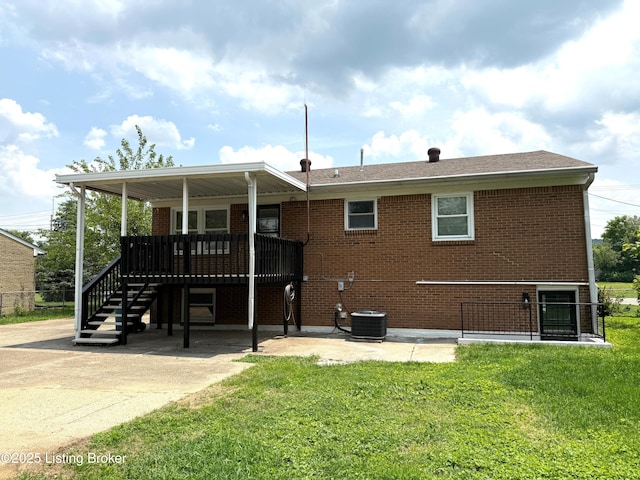 11302 Deering Rd, Louisville, KY 40272 - back of property featuring a lawn, brick siding, stairs, and a patio