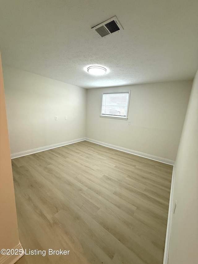 11302 Deering Rd, Louisville, KY 40272 - spare room with light wood-type flooring and baseboards