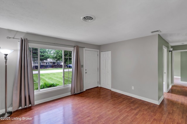 6106 Dobson Ct, Louisville, KY 40229 - foyer entrance featuring wood finished floors and baseboards