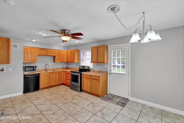6106 Dobson Ct, Louisville, KY 40229 - kitchen featuring appliances with stainless steel finishes, a sink, light countertops, and a ceiling fan