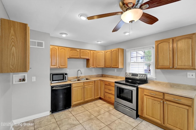6106 Dobson Ct, Louisville, KY 40229 - kitchen with appliances with stainless steel finishes, a sink, light tile patterned floors, light countertops, and light brown cabinetry
