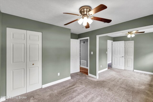 6106 Dobson Ct, Louisville, KY 40229 - unfurnished bedroom with carpet flooring, baseboards, ceiling fan, and a closet