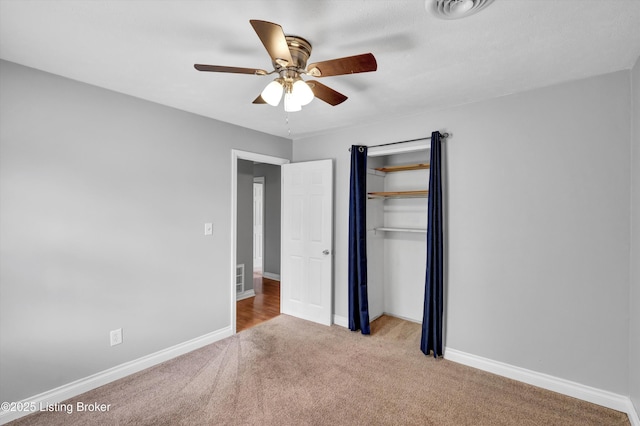 6106 Dobson Ct, Louisville, KY 40229 - unfurnished bedroom featuring carpet, baseboards, a closet, and ceiling fan