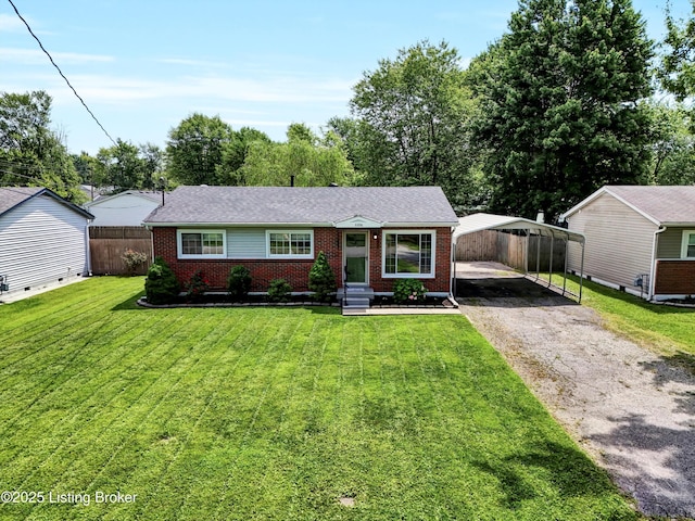 6106 Dobson Ct, Louisville, KY 40229 - ranch-style house featuring brick siding, a carport, and driveway