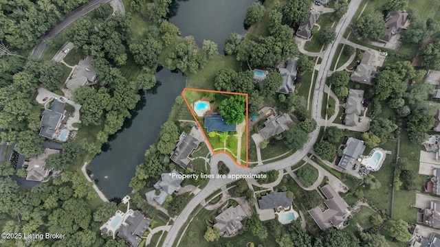 527 Woodlake Dr, Louisville, KY 40245 - aerial view of property and surrounding area with a large body of water and property boundaries highlighted