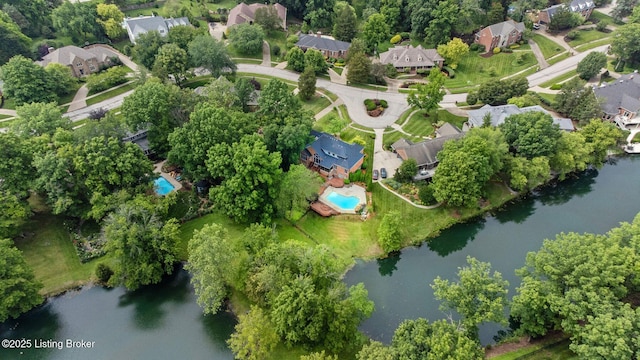 527 Woodlake Dr, Louisville, KY 40245 - aerial view of property's location with nearby suburban area and a nearby body of water