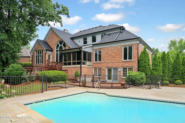 527 Woodlake Dr, Louisville, KY 40245 - view of swimming pool with a sunroom, stairs, and a patio
