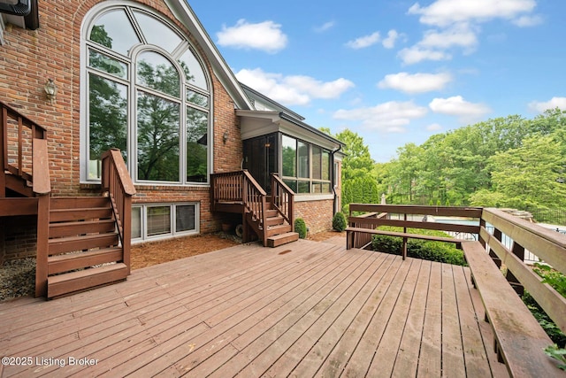 527 Woodlake Dr, Louisville, KY 40245 - wooden deck with a sunroom and stairway